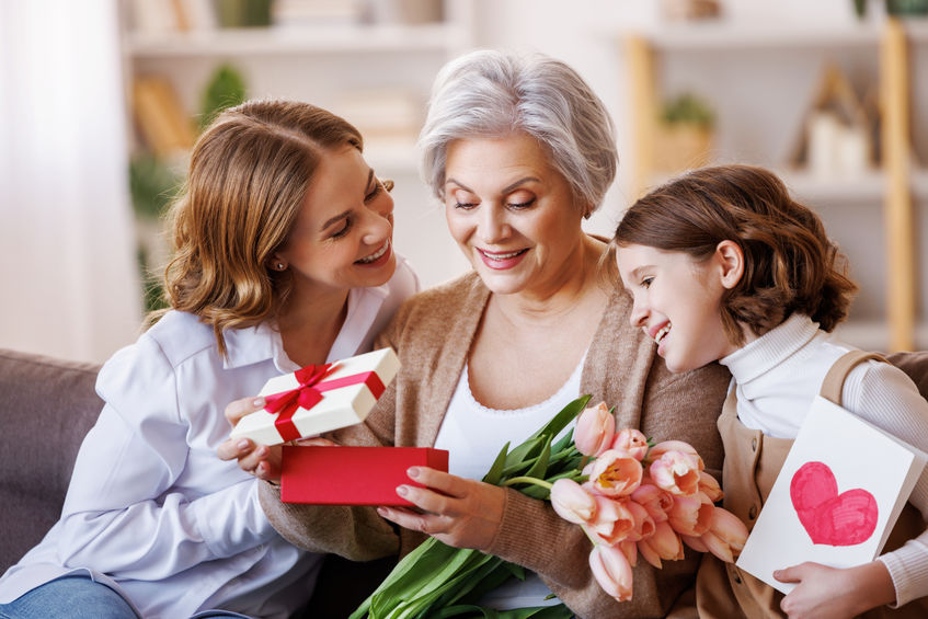 A grandma, mother, and daughter all enjoying mother's day